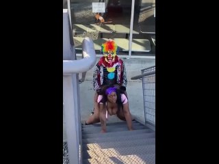 the hellish clown caught a big black mommy and fucked her on the stairs.